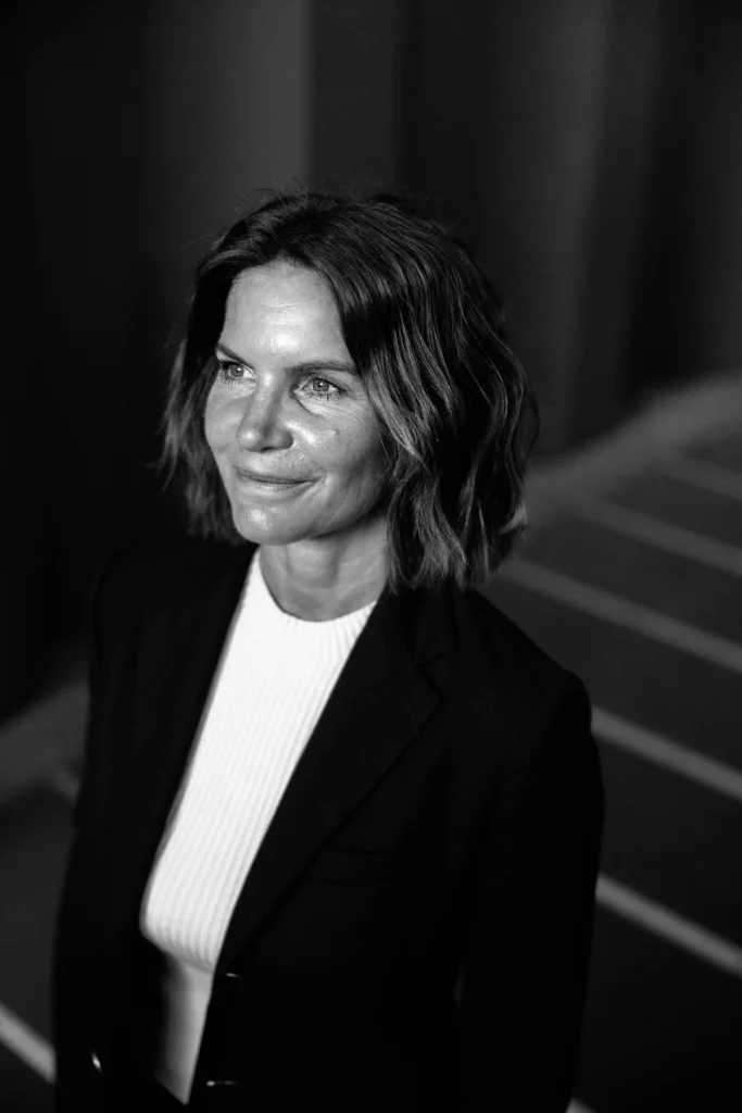Black-and-white portrait of Mathilde Holmer in a dark blazer